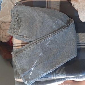Miraclebody jeans size 10 faded blue jeans.